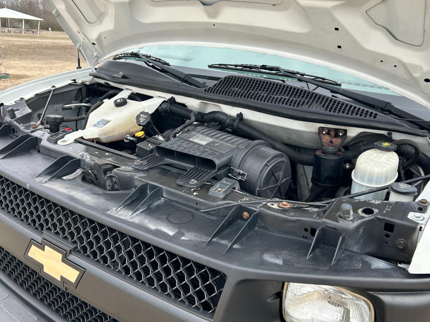 2012 White /Gray Chevrolet Express 2500 Cargo (1GCWGFCB4C1) with an 6.0L V8 OHV 16V FFV engine, 6-Speed Automatic transmission, located at 17760 Hwy 62, Morris, OK, 74445, (918) 733-4887, 35.609104, -95.877060 - Photo#17